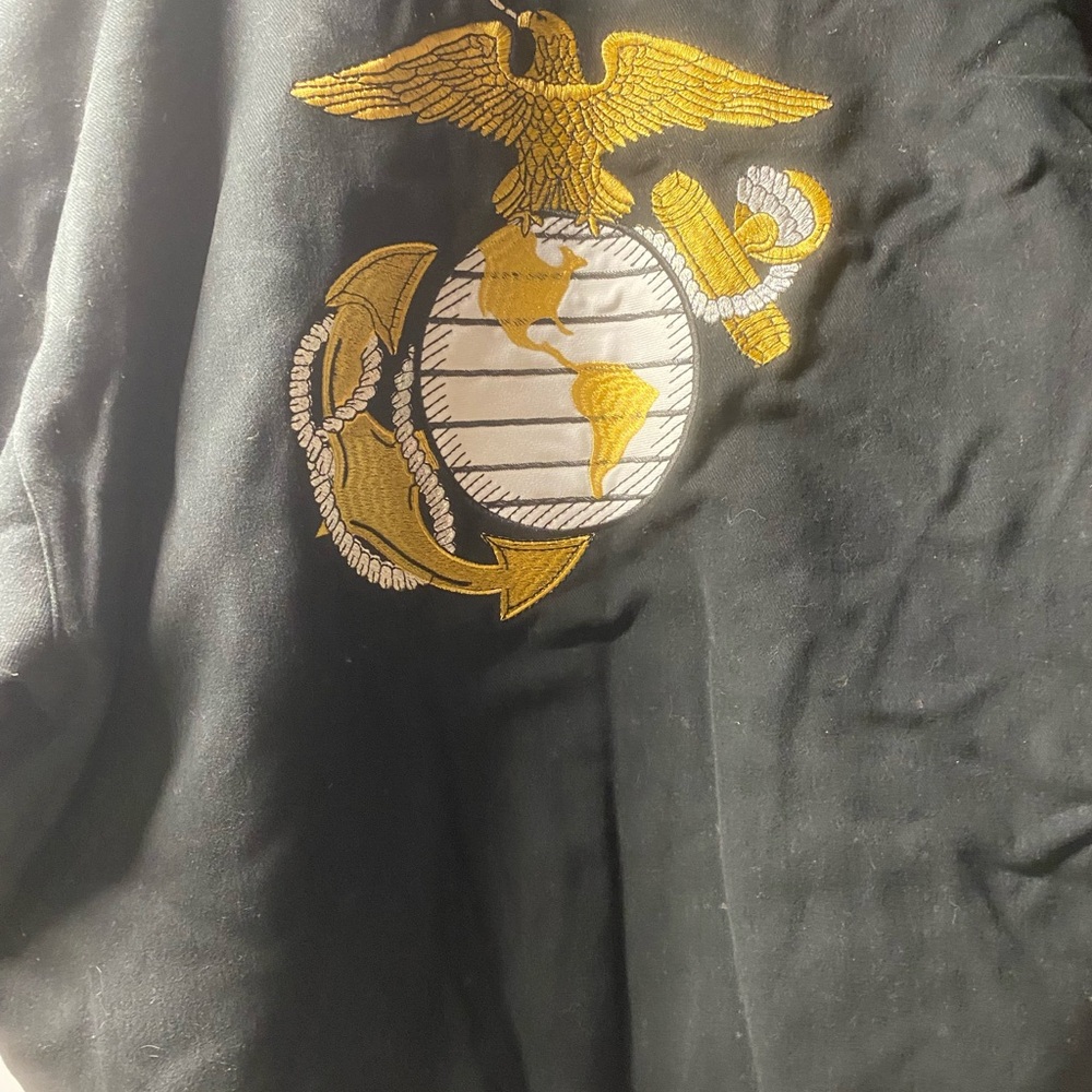 Never worn Men’s  large black Marine jacket.